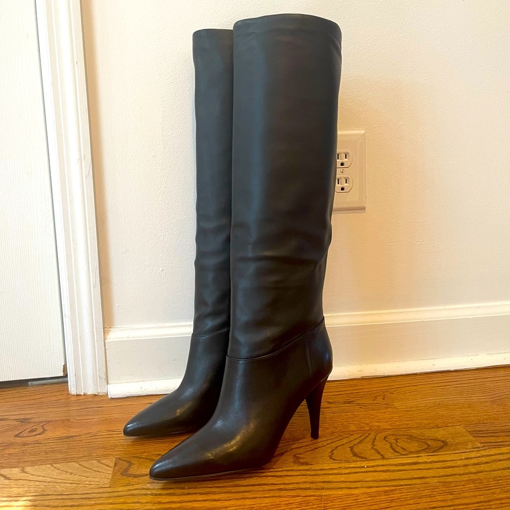 NWOT Michael Kors genuine leather knee high, high heeled boots. Brand new